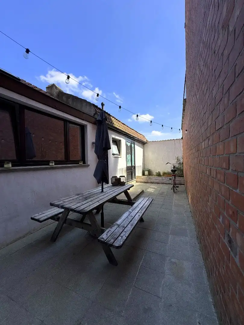 Instapklare woning met 2 slaapkamers en ruime binnenplaats in Menen foto 13