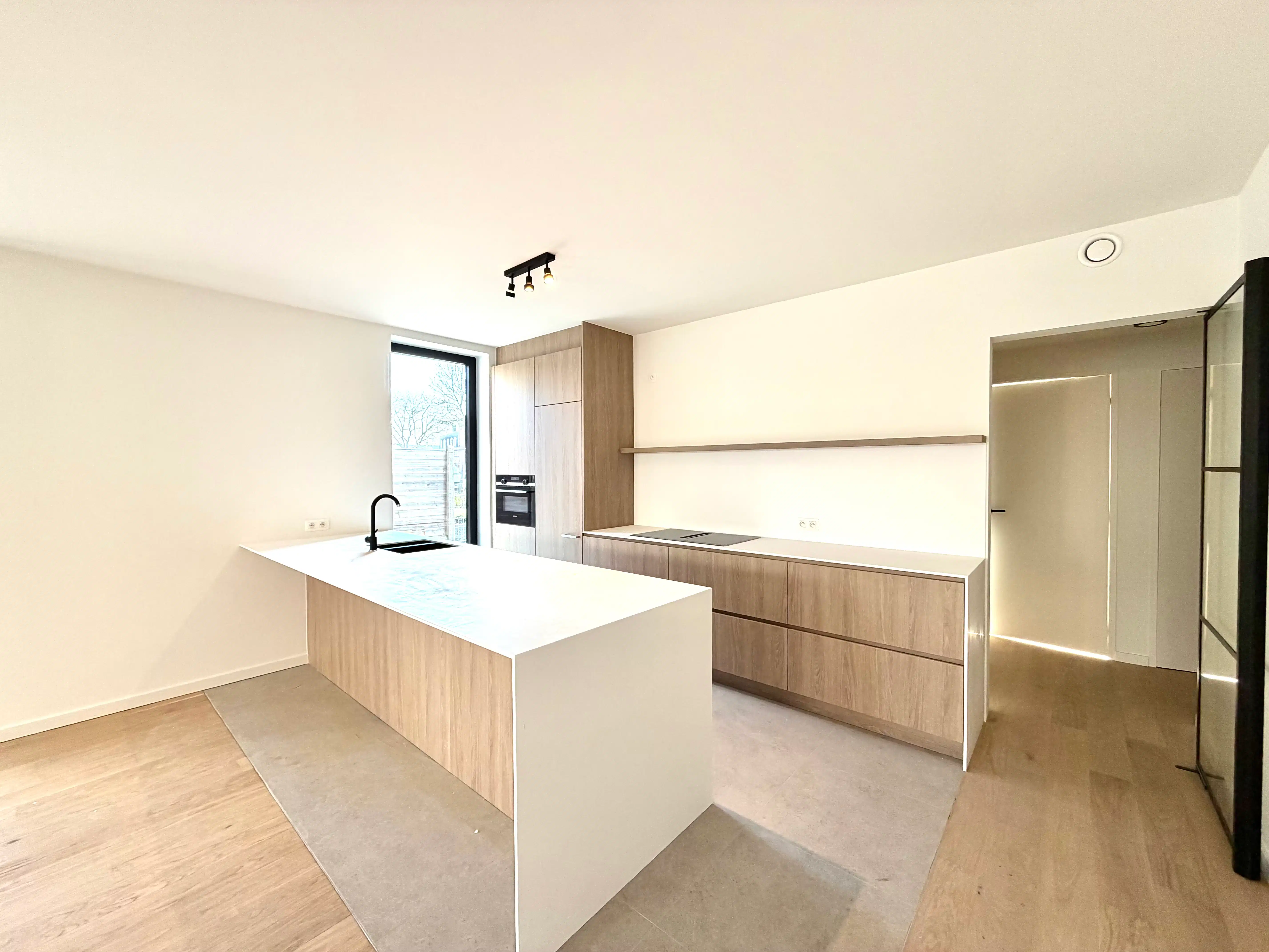 Nieuwbouwappartement met 2 slaapkamers te huur in Sleidinge foto {{pictureIndex}}