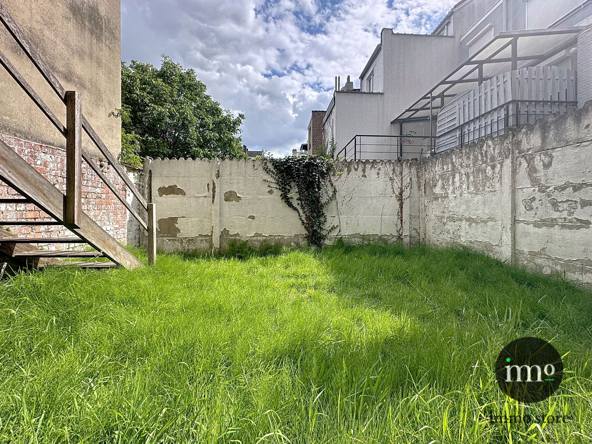 Goedgelegen rijwoning met 3, mogelijks 4 slaapkamers en tuin foto 4
