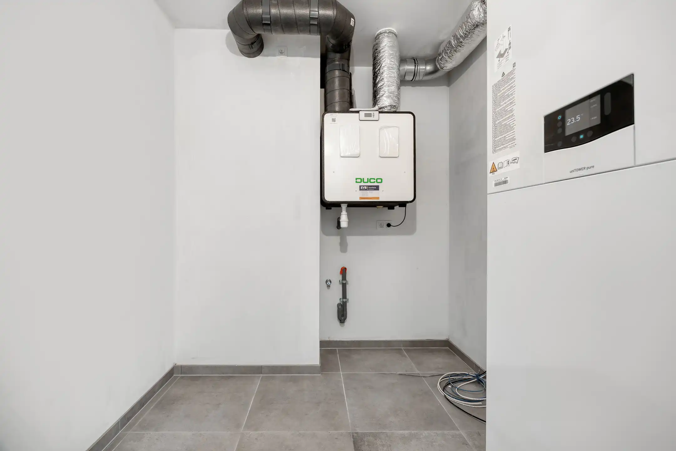 Stijlvol gelijkvloers appartement met tuin foto 15