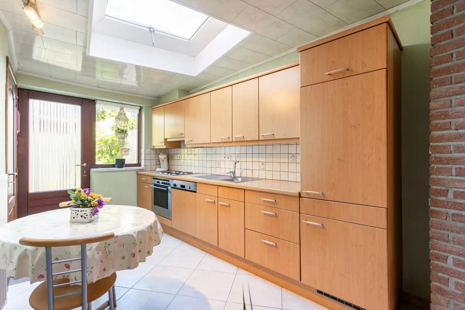 Verzorgde woning met 3 slaapkamers en leuke tuin te Halle foto 8