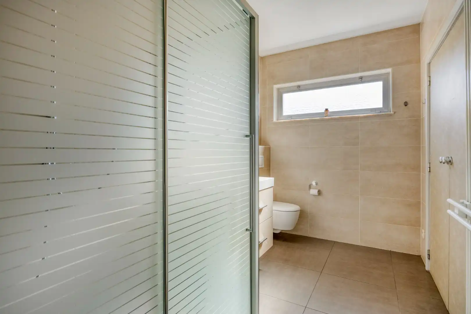 Goed onderhouden ruim ingedeelde woning met 3 slpks + zolder foto 15