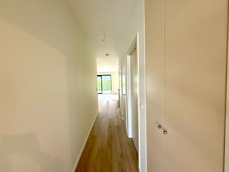 Centraal gelegen, gelijkvloers appartement met 2 slaapkamers en ruim terras met zicht op de Leie foto 12