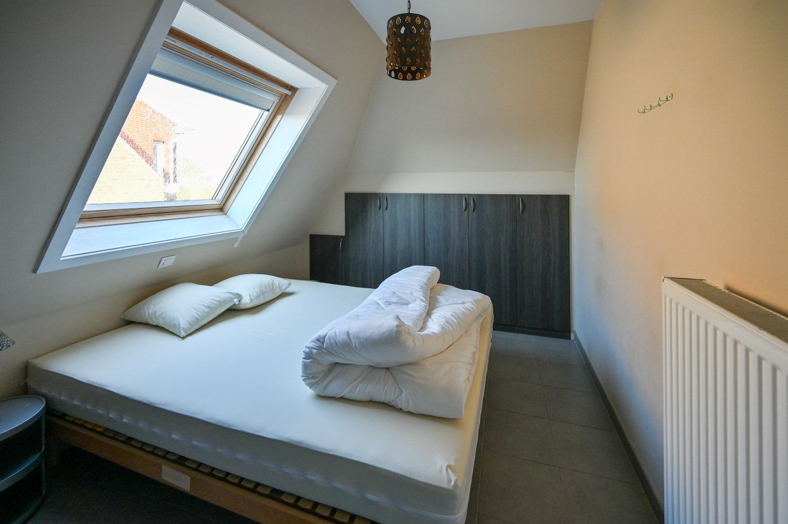 Ruim duplexappartement met 3 slaapkamers in De Haan aan zee foto 12
