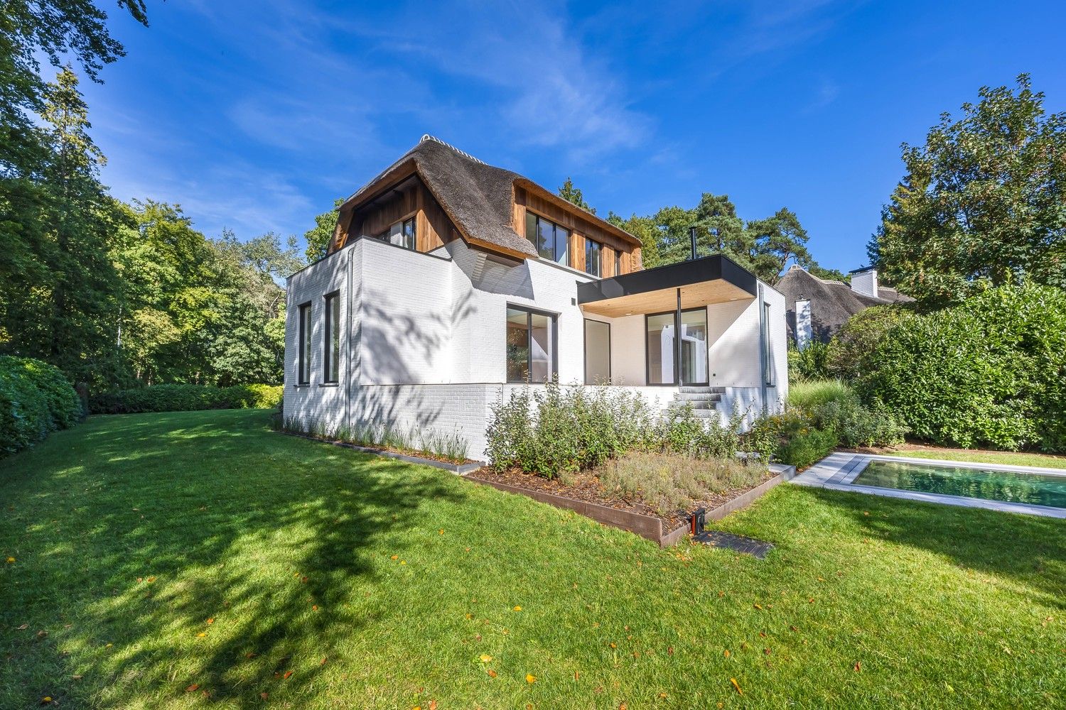 Luxueuze rietgedekte villa met zwembad & wellness in Schotenhof foto 23