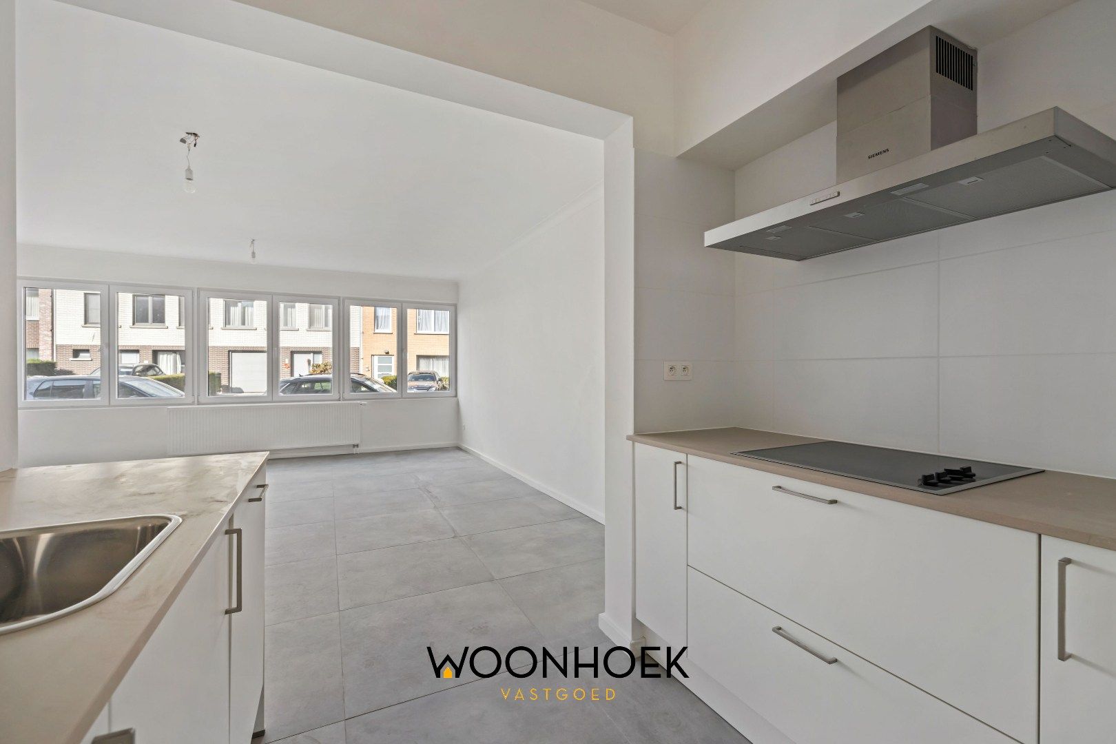 Gerenoveerd appartement op toplocatie te Belsele! foto 6
