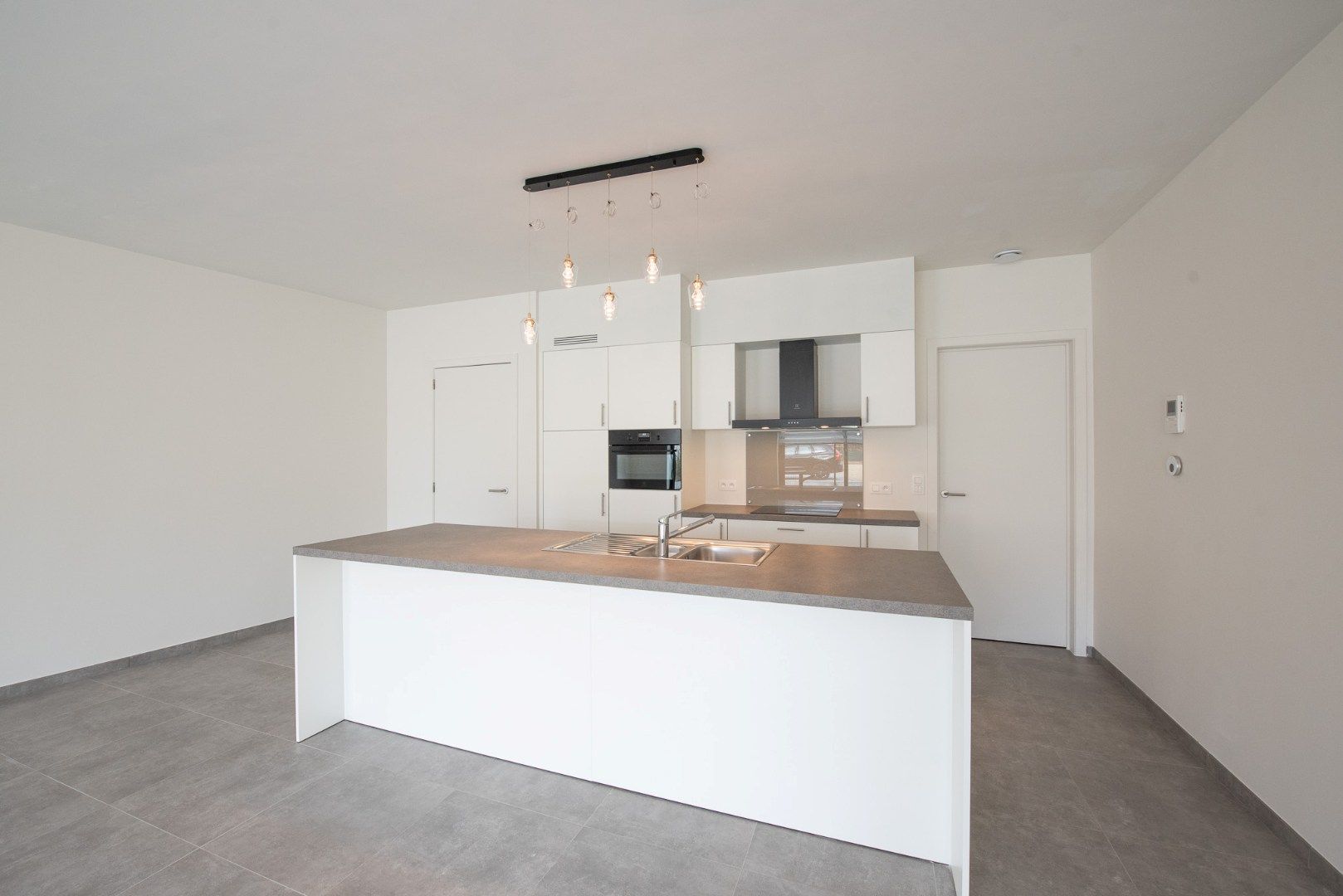 GLV nieuwbouwappartement met garage  en tuintje TE HUUR in Waregem! foto 3