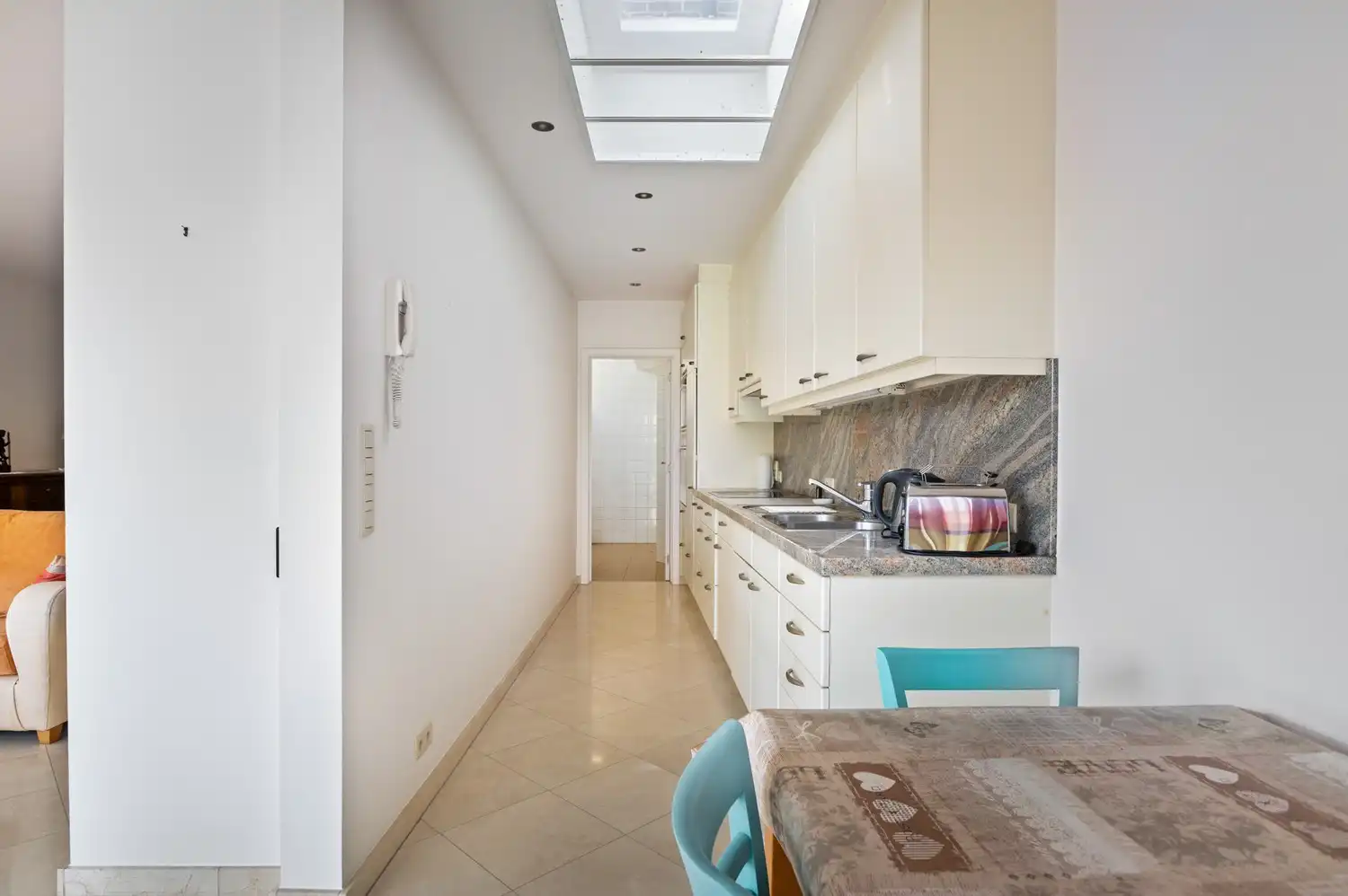 Opbrengsteigendom of co-housing met 2 ruime appartementen in het centrum van Broechem! foto 9