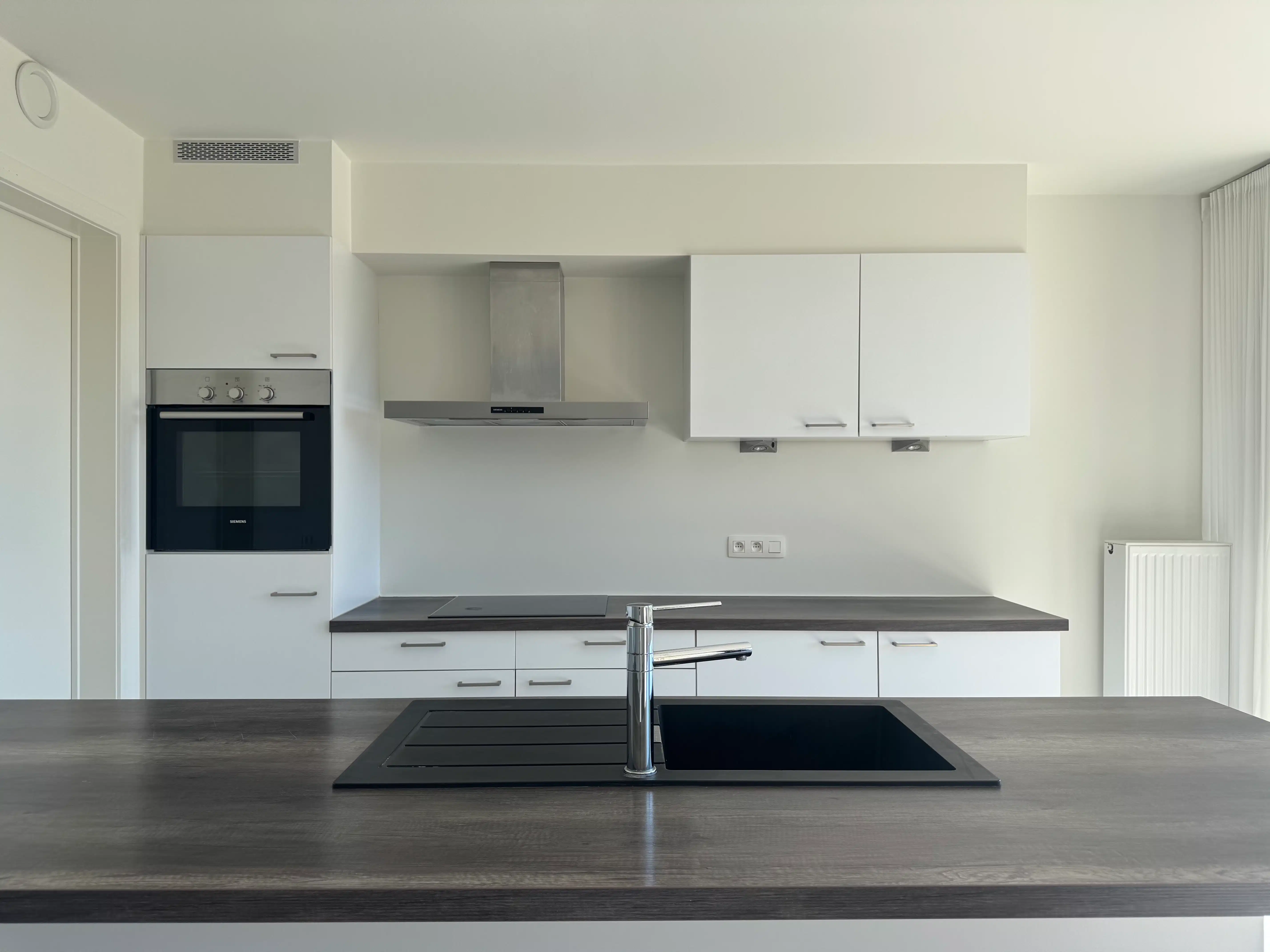 Ruim 2-slaapkamer appartement nabij centrum Genk foto 10