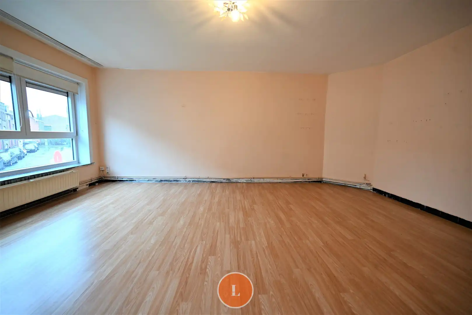 Opbrengsteigendom met 2 appartementen en 2 garages foto 3