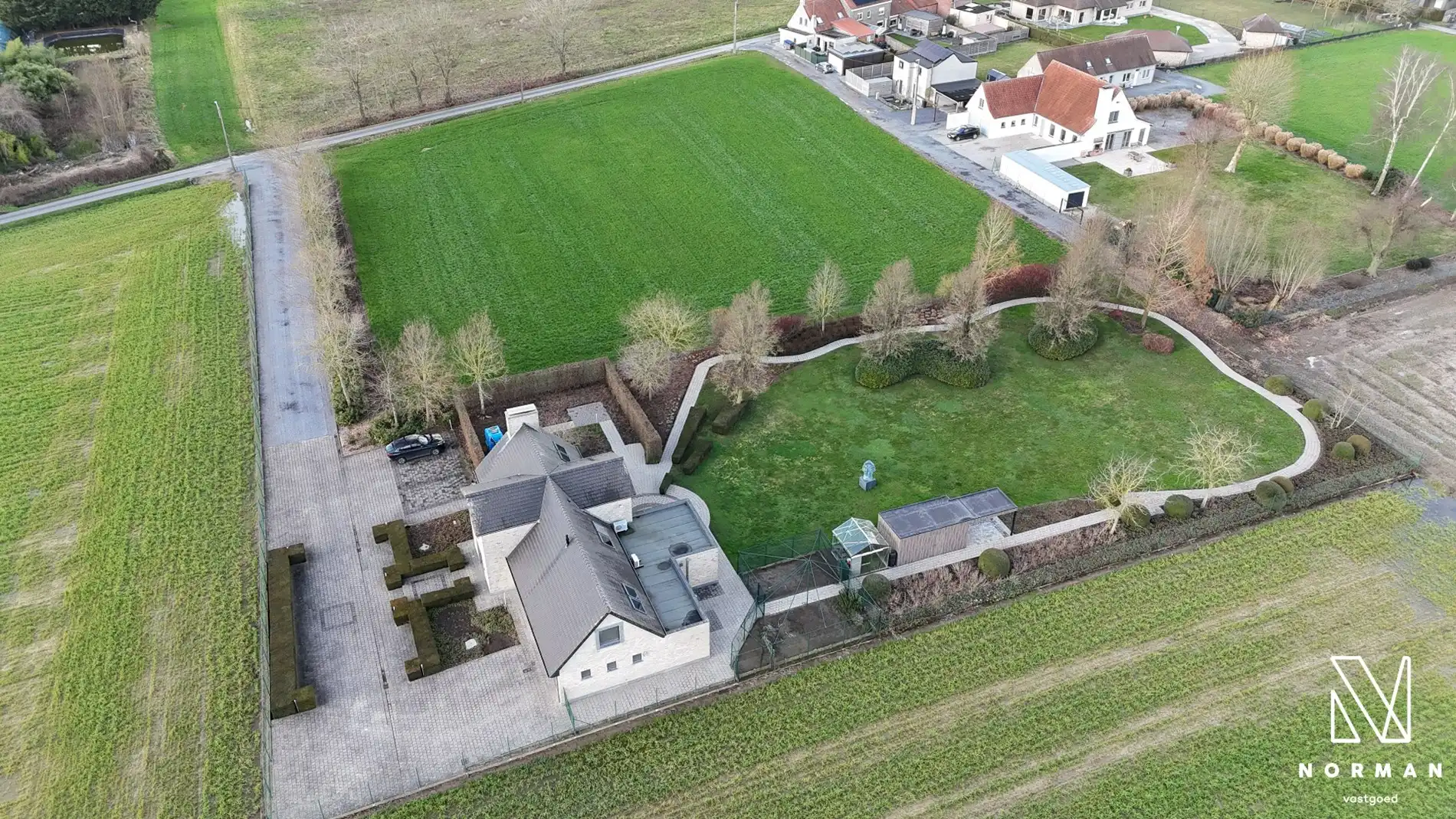 Prachtig domein met luxueuze instapklare villa, grote tuin en landbouwgrond in Hulste foto 47