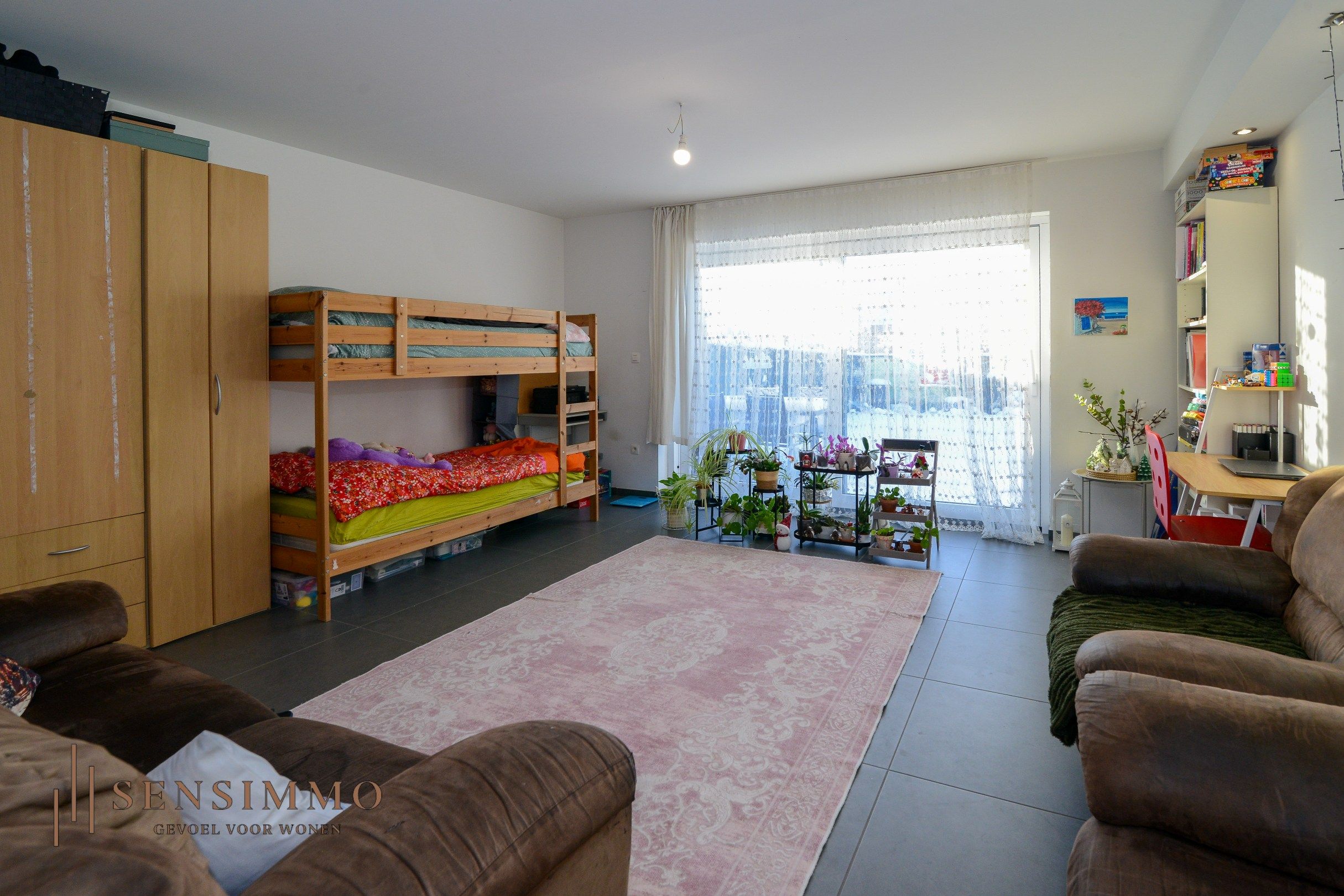 Gelijkvloers éénslaapkamer appartement met tuin, parking en kelderberging foto 7