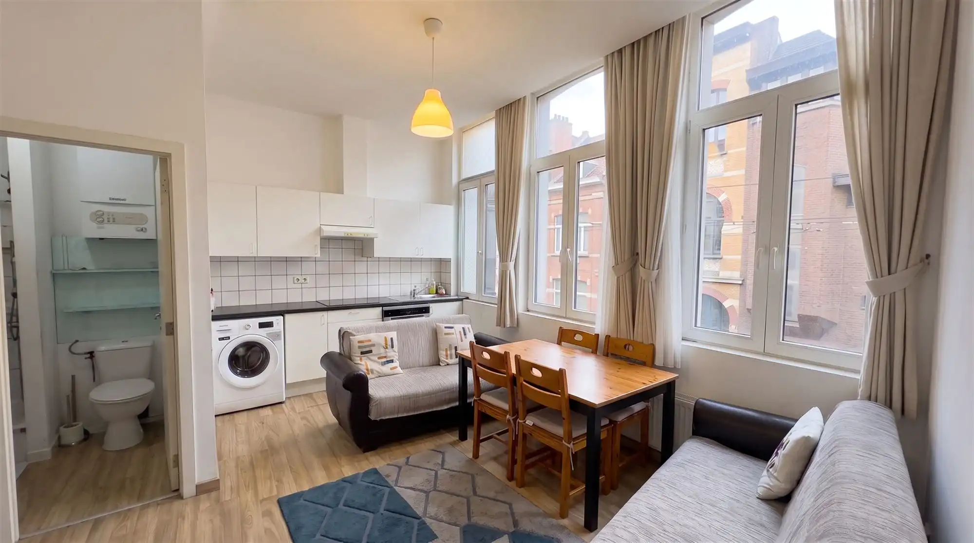 Rendabele opbrengsteigendom met 3 appartementen en handel. foto 3
