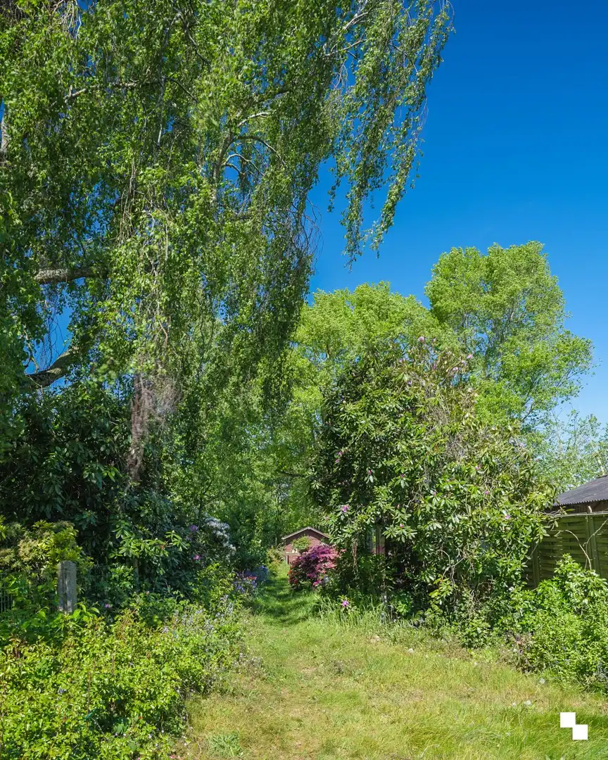 Te renoveren woning met gezellige tuin in het hart van Merelbeke foto 21