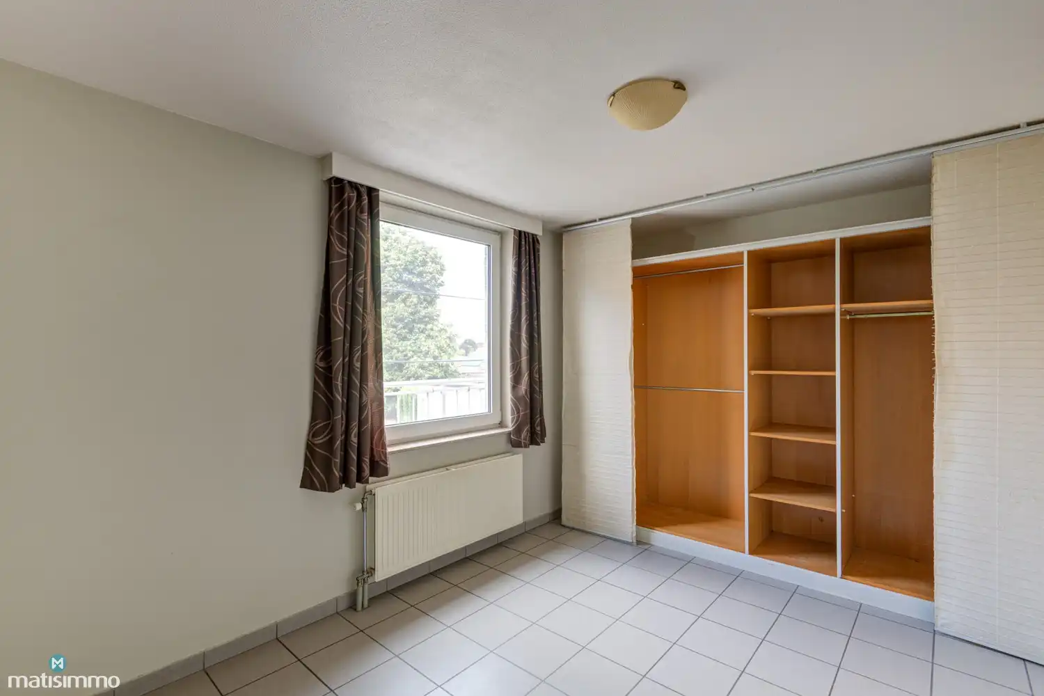 APPARTEMENT MET TWEE SLAAPKAMERS EN GARAGE IN HET CENTRUM VAN HOESELT foto 8