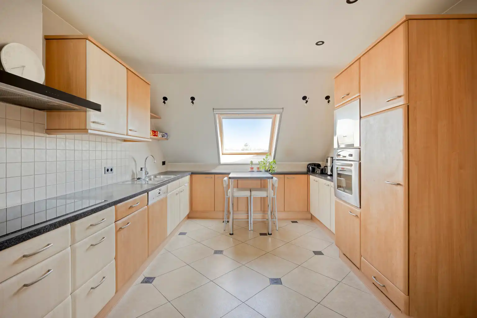Ruim penthouse met 5 slaapkamers, 2 zuid terrassen en garage foto 9