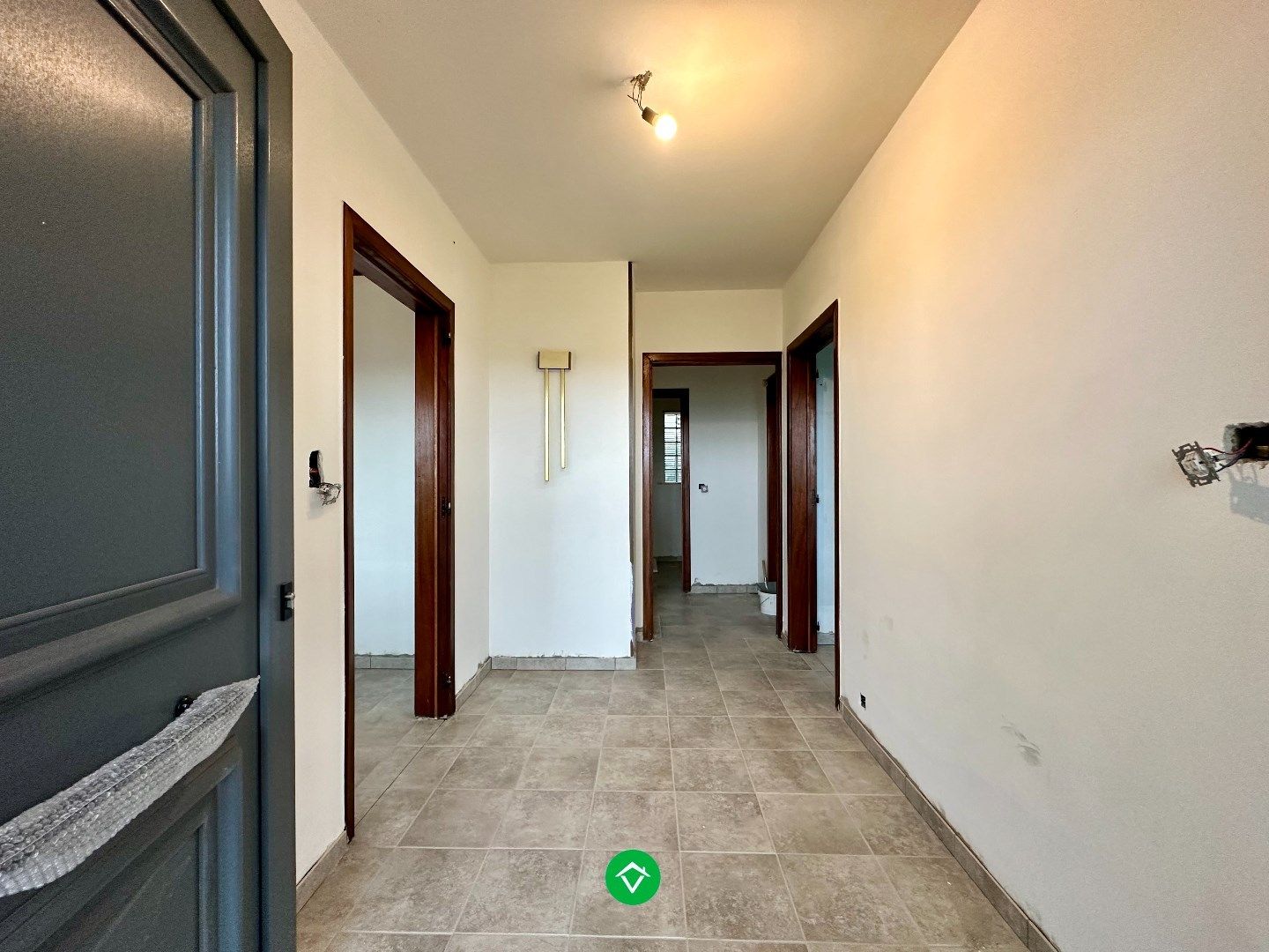 Alleenstaande woning met 2 slaapkamers en inpandige garage foto 2