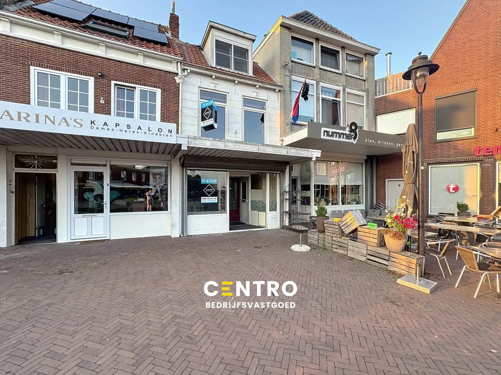 Handelspand met woonst met uitzicht over de Markt! foto {{pictureIndex}}