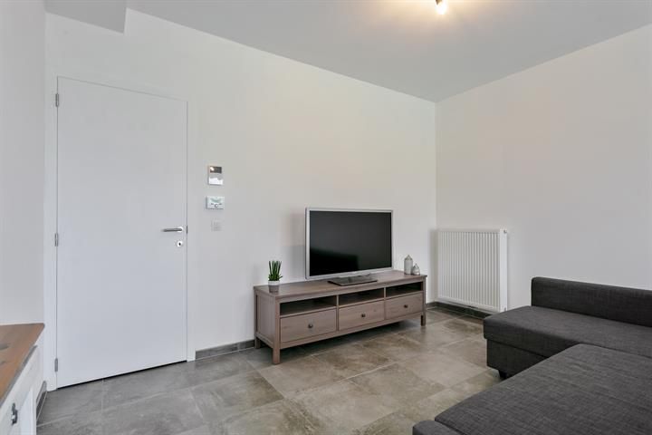 Gelijkvloers appartement met terras en tuintje foto 8