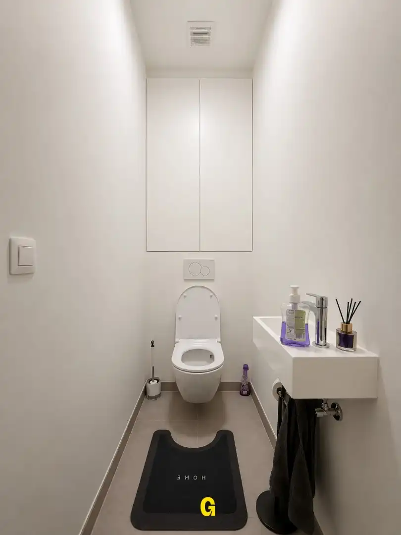 Knap afgewerkt gelijkvloersappartement met 2 slaapkamers, ruim terras en tuintje met tuinberging foto 19