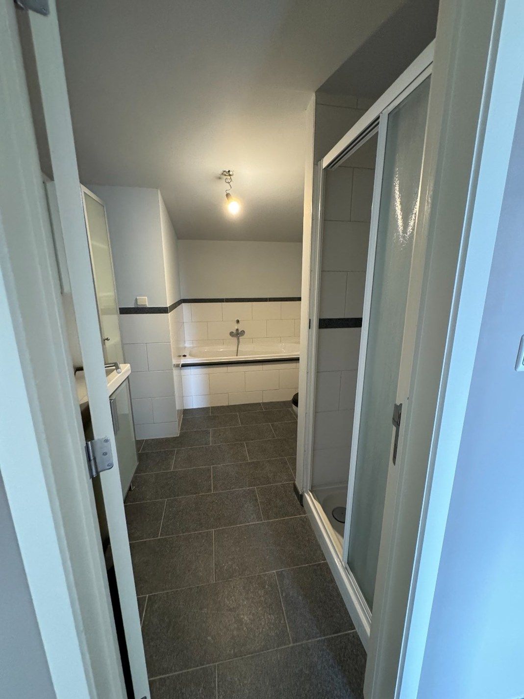 Duplex appartement met 3 slaapkamers en 2 autostaanplaatsen in hartje Beringen foto 16
