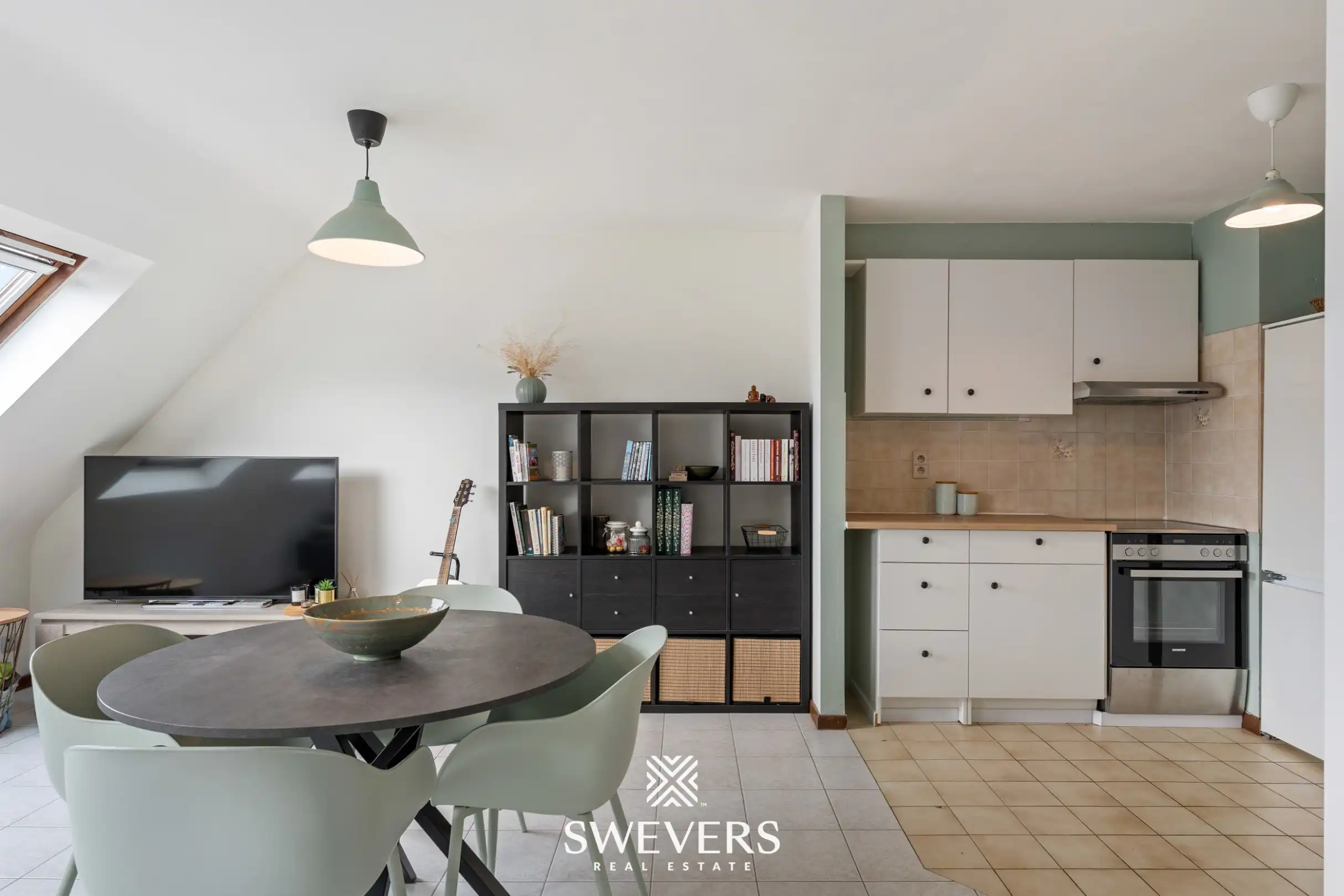 Instapklaar en lichtrijk 1-slaapkamerappartement op topligging in Houthalen centrum foto 12