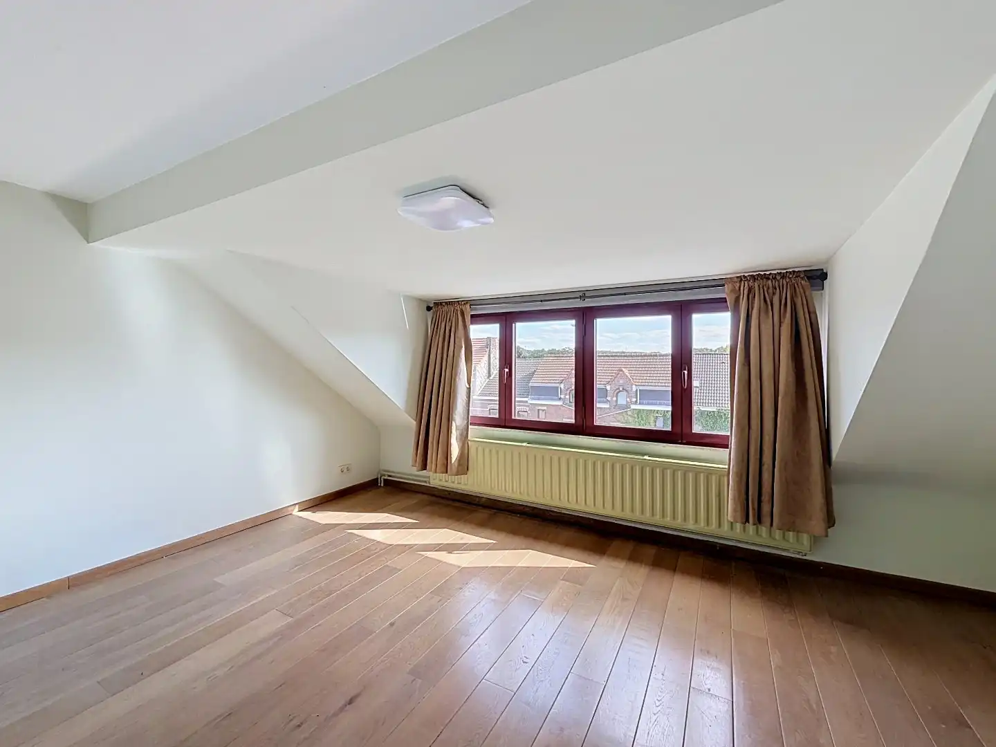Ruime bel-etagewoning met 4 slaapkamers en grote zuidoostgerichte tuin in Leuven foto 19