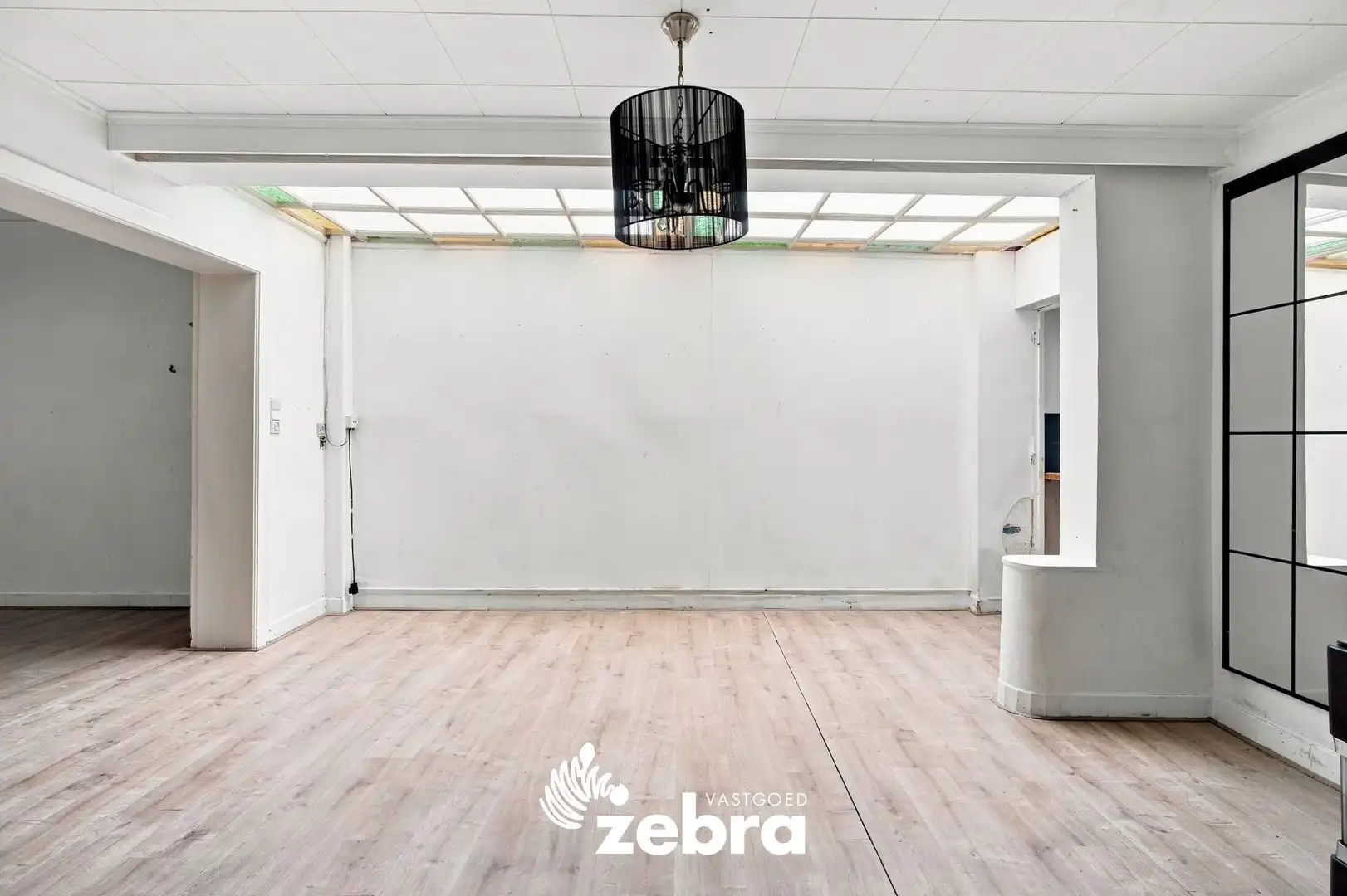 Op te frissen woning met 4 slaapkamers en ruime tuin met uitweg te Tielt! foto 8