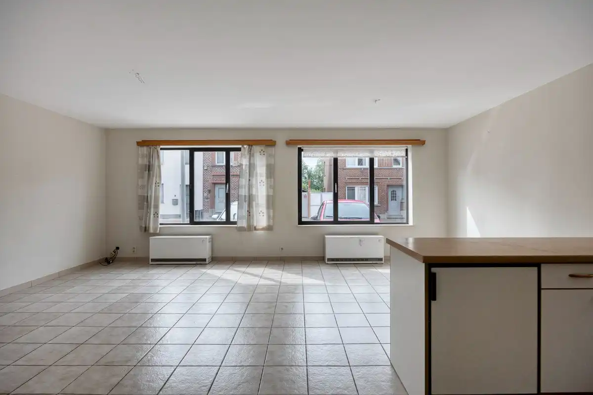 Opbrengsteigendom met 3 appartementen en 7 garages foto 8