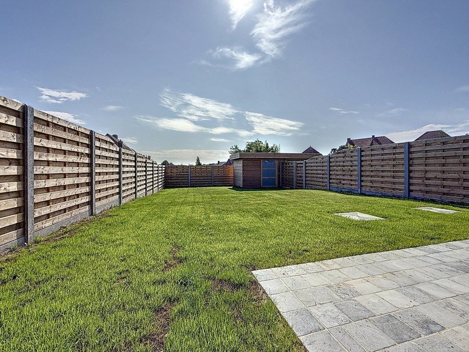 Prachtige half-open nieuwbouwwoning met carport in het centrum van Westrozebeke foto 9