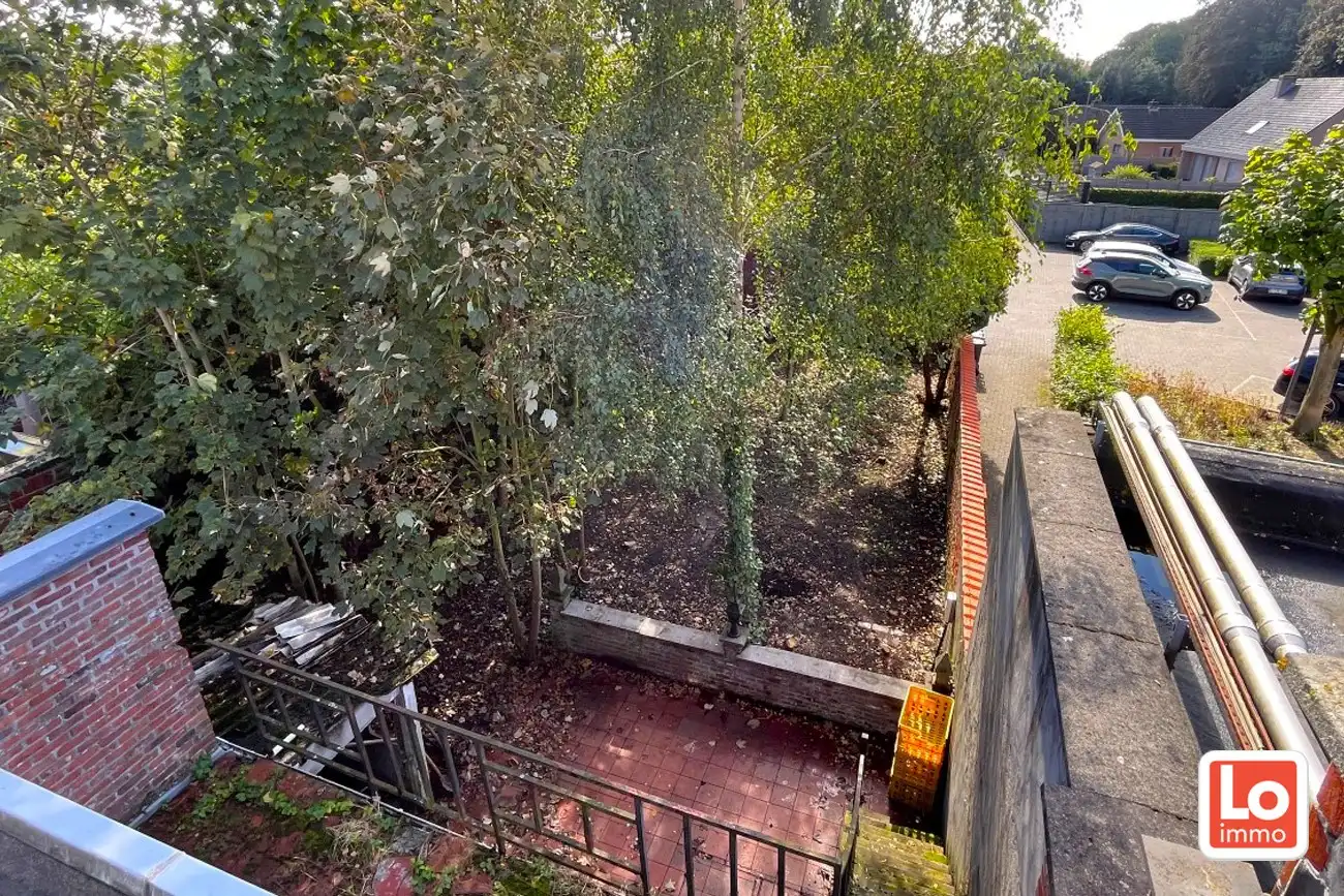 Te renoveren woning met 3 slaapkamer en tuin op een topligging in Centrum Lochristi foto 3