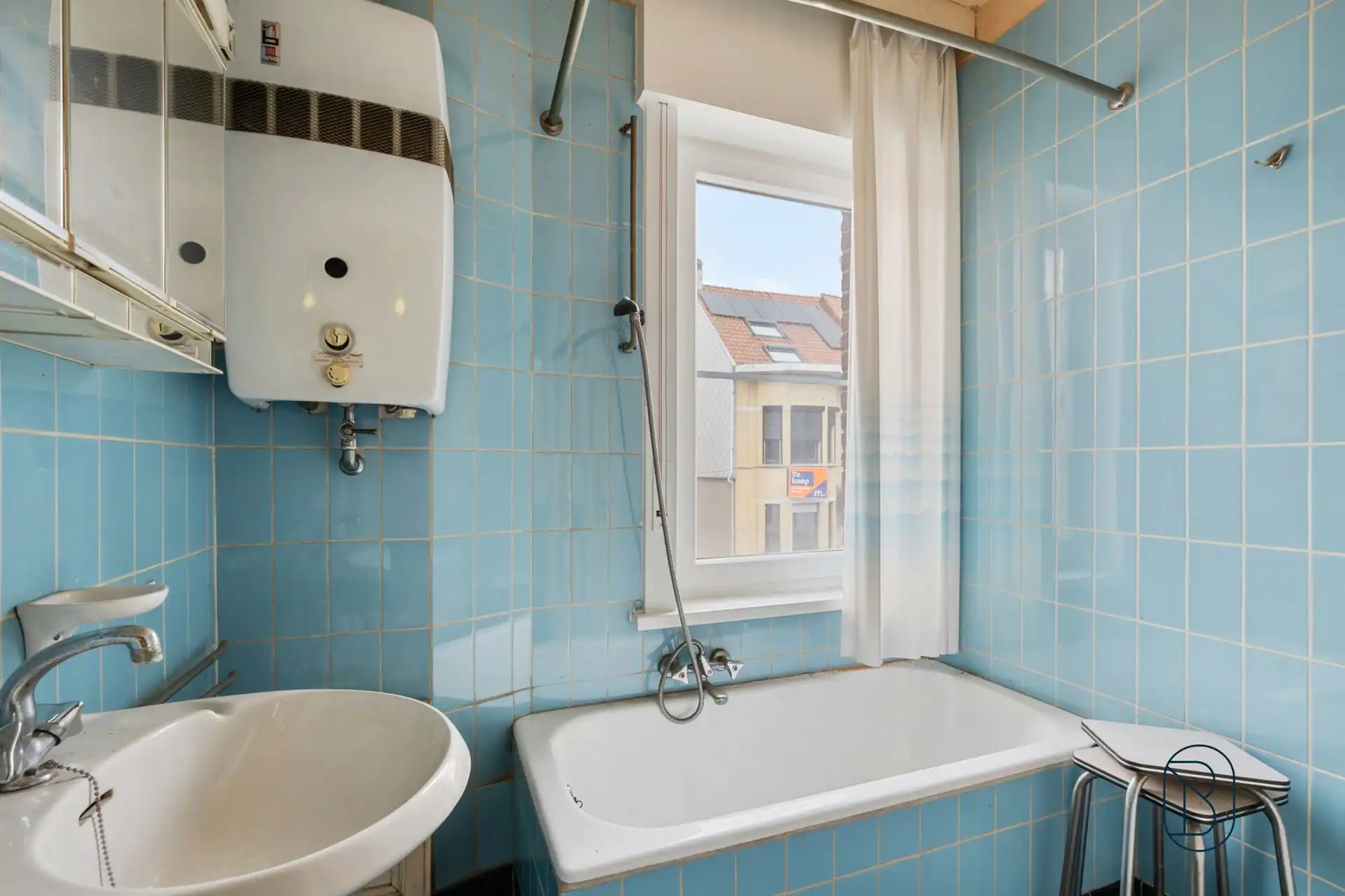 Te renoveren gezinswoning met 3 slaapkamers en grote tuin! foto 14