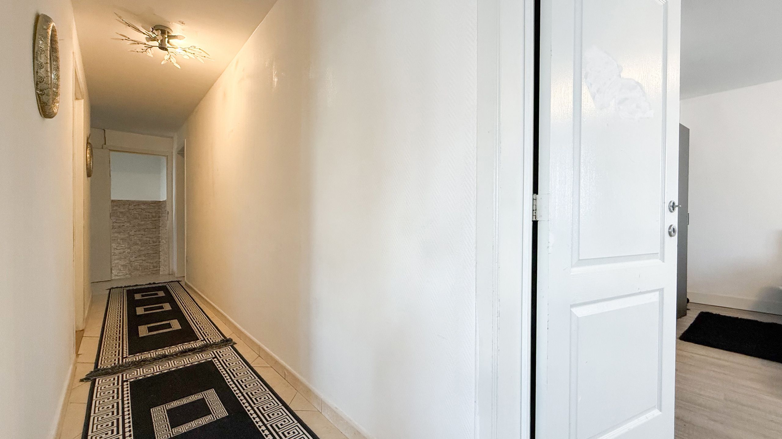 Lichtrijk appartement met 3 slpks, tuin én staanplaats! foto 9