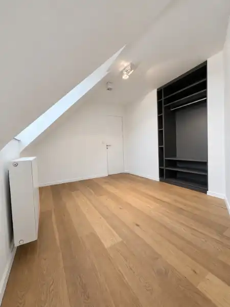 Stijlvol dakappartement met terras en veel privacy in het centrum van Geel foto 16