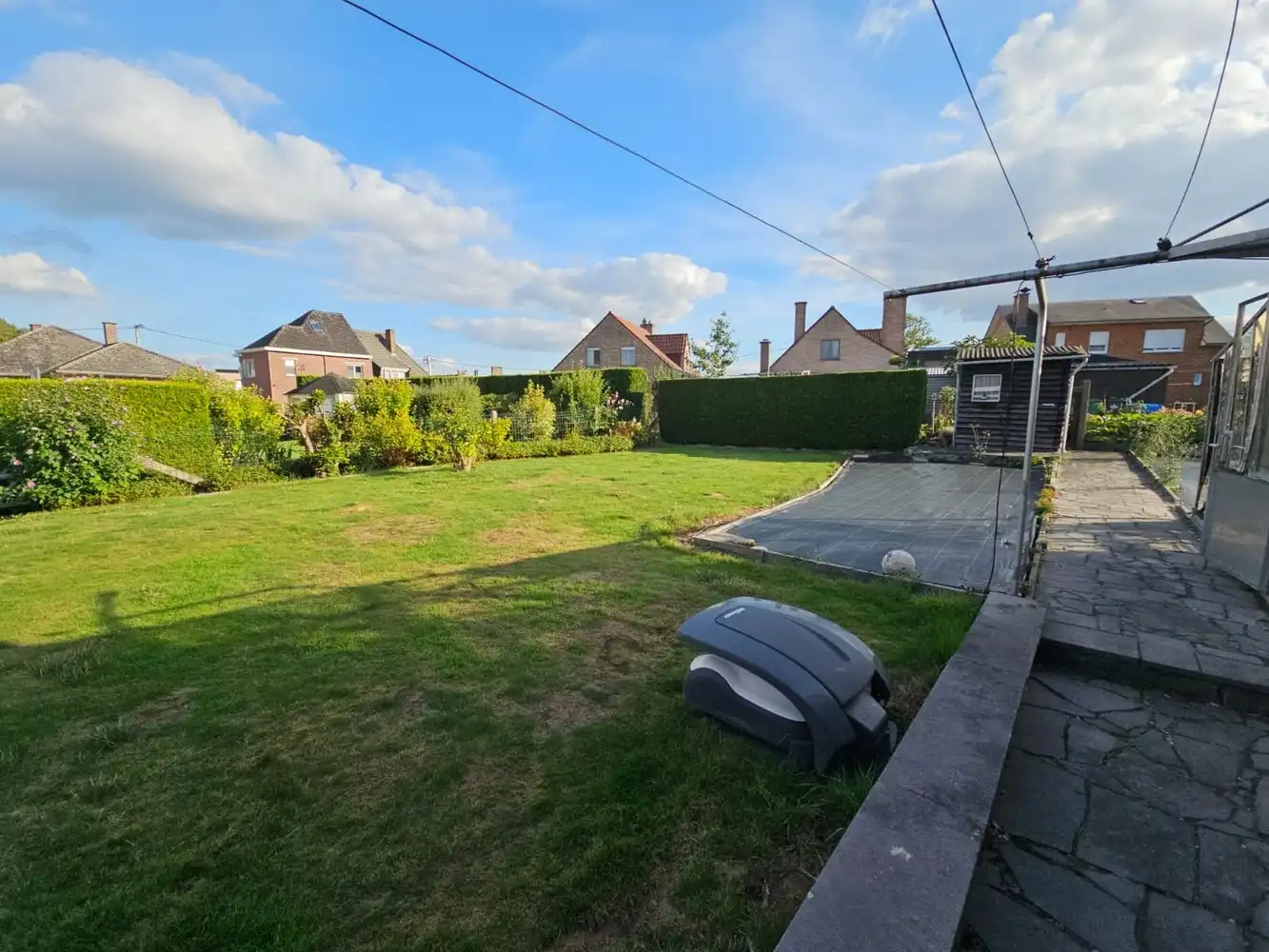 Open bebouwing met tuin en aparte garage foto 7