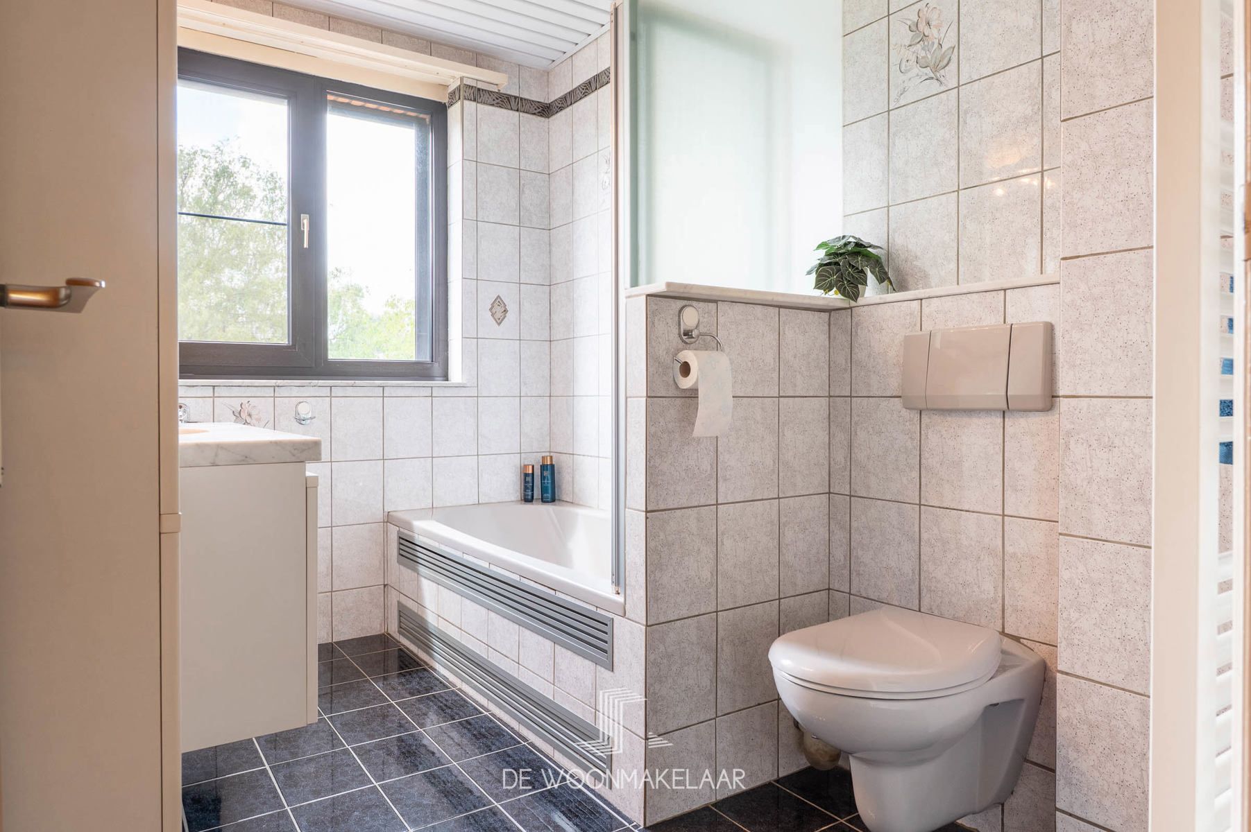Verzorgde bel-etage met 3 slk en ZW tuin in rustige woonwijk foto 13