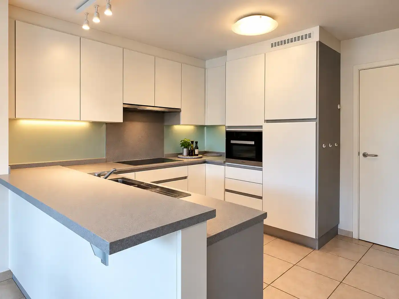 Riant en instapklaar appartement met tuin en 2 slaapkamers in centrum Herent foto 5