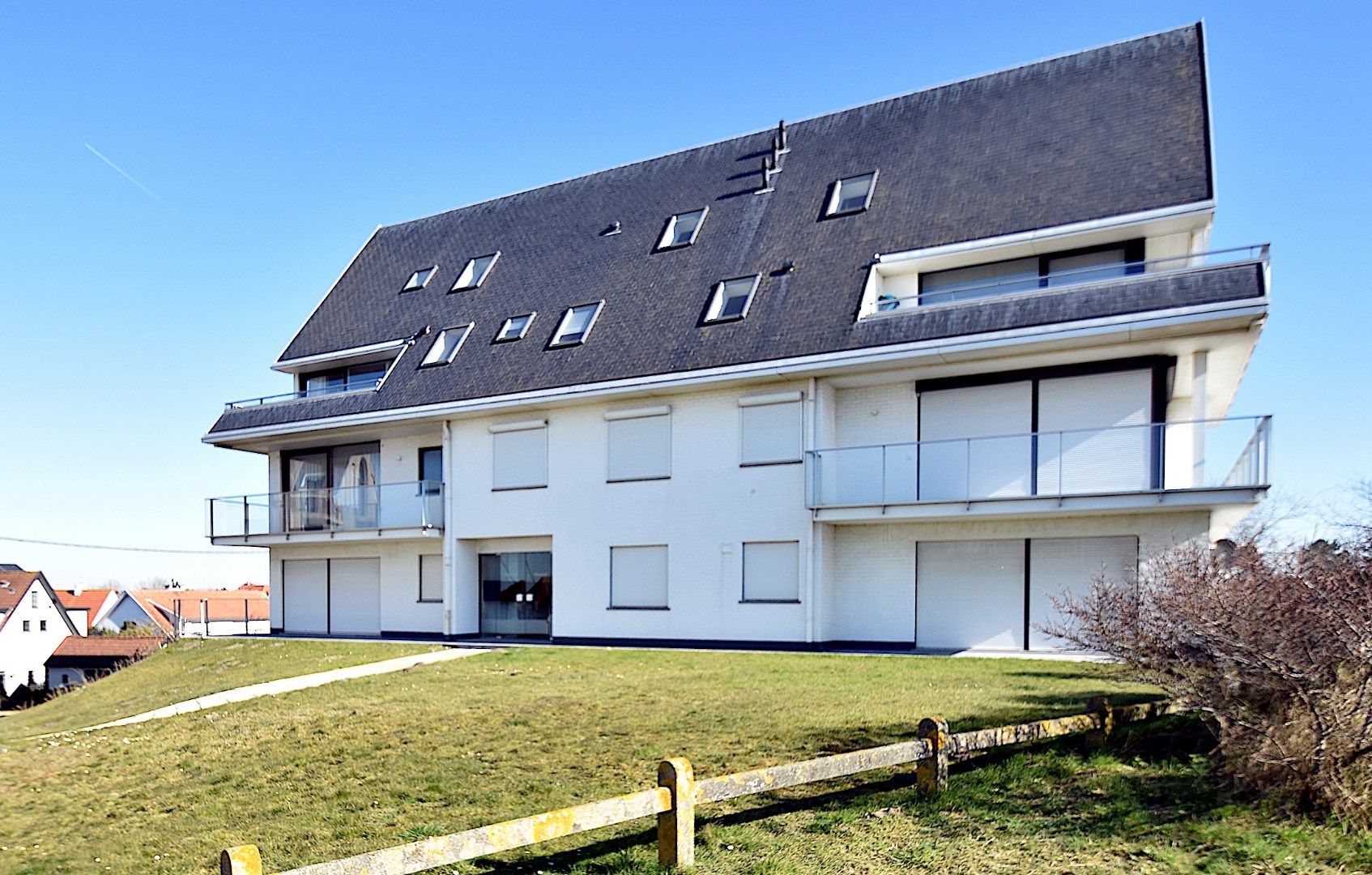 Lichtrijk appartement met adembenemend zicht op de duinen en de zee foto 22