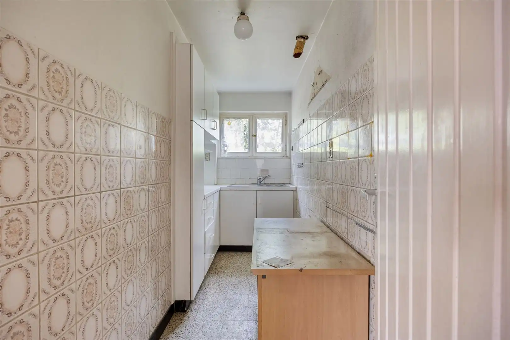 TE KOOP: Te renoveren woning met ruim perceel en projectmogelijkheden in Lummen! foto 10