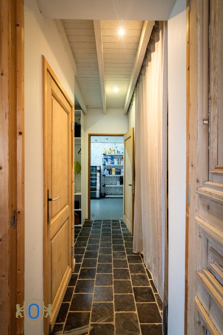 Halfopen 3-slpkr woning met tuin & carport foto 16