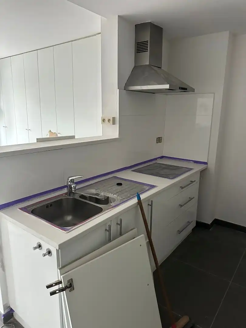 Ruim gelijkvloersappartement met 2 slaapkamers , een  zuidgeorienteerde  tuin en garage foto 5