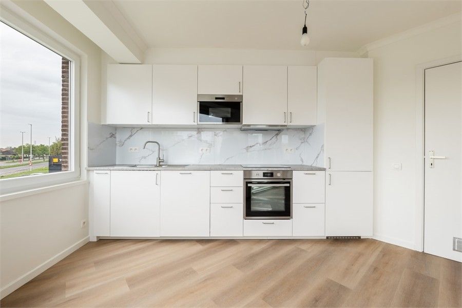 KNAP APPARTEMENT MET 2 SLKS EN PARKEERPLAATS VLAKBIJ HET CENTRUM VAN SINT-TRUIDEN foto 12