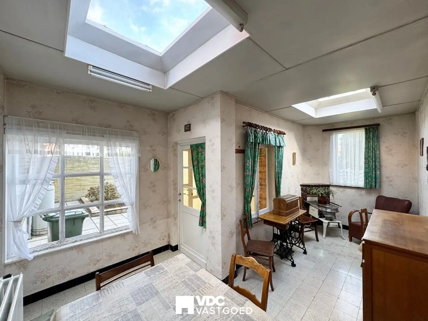 Charmante te renoveren woning met tuin, garage en sterk investeringspotentieel foto 8