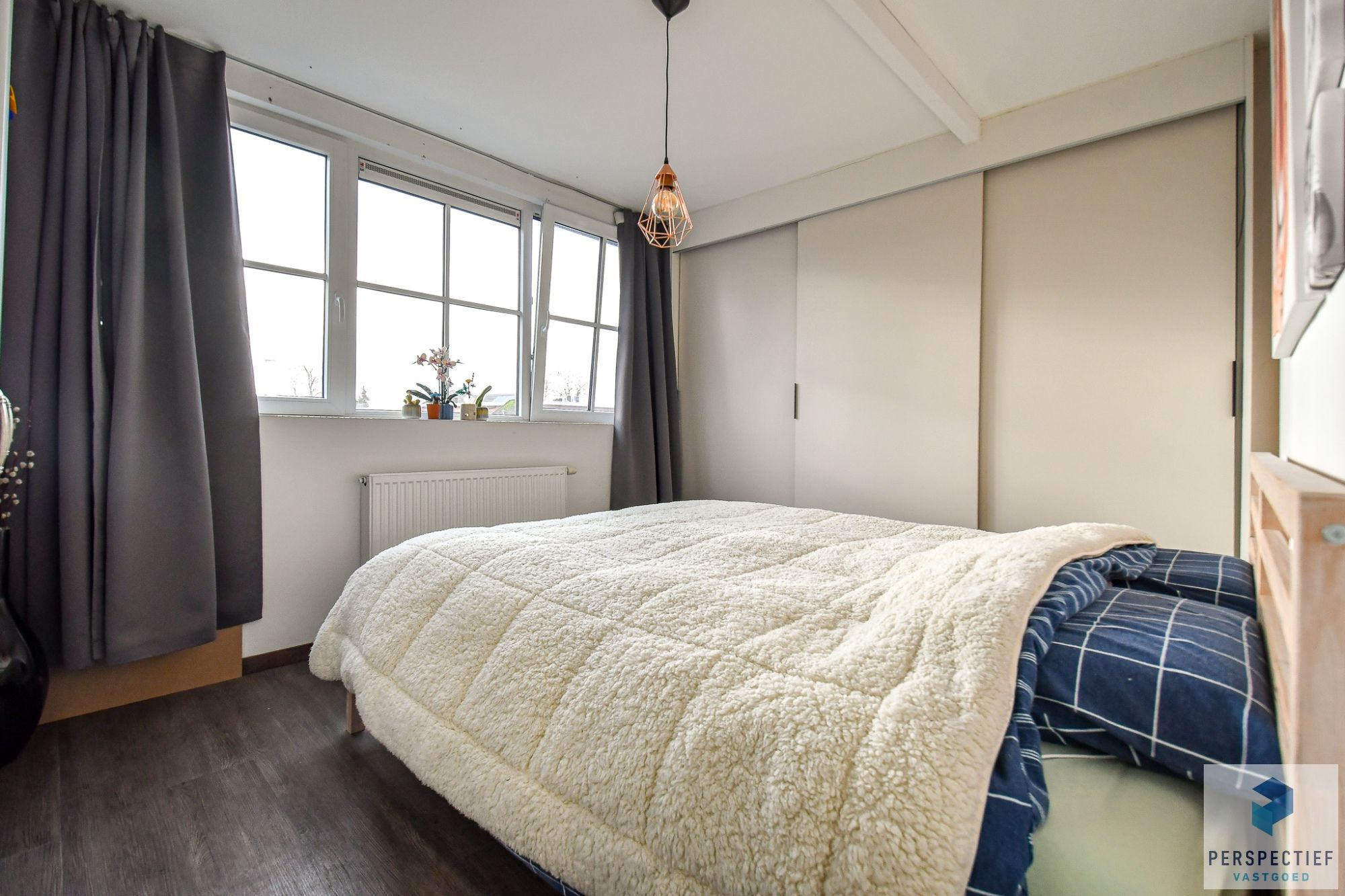 Ruime charmante gerenoveerde woning met 2 slaapkamers, tuin en parkeermogelijkheid achteraan foto 11