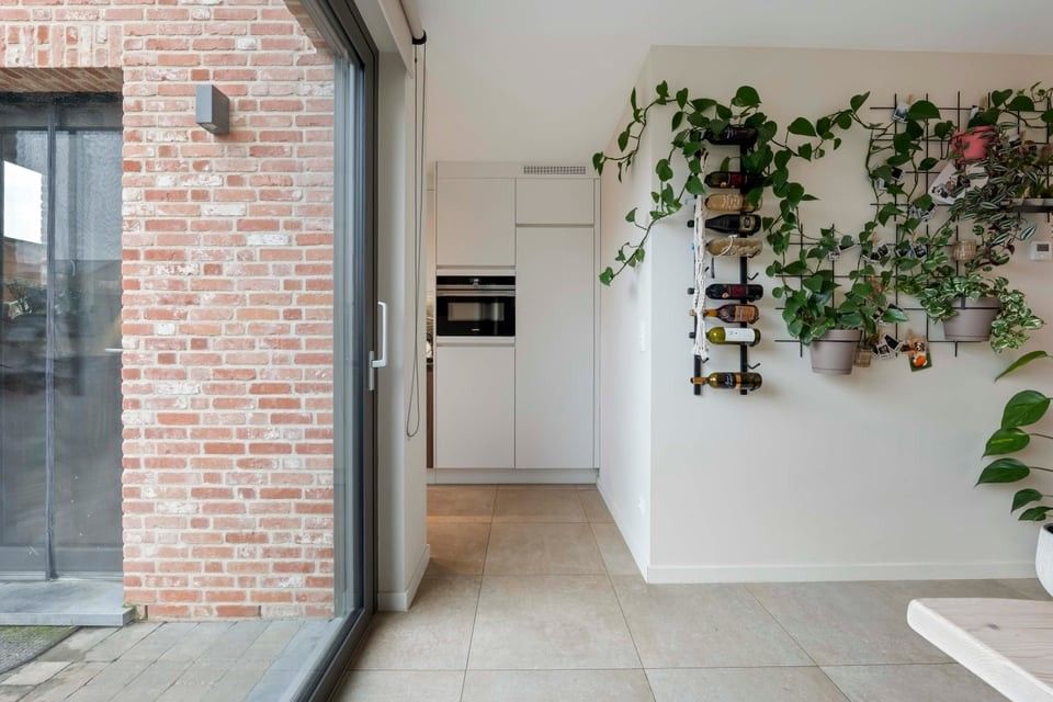 PRACHTIG NIEUWBOUWAPPARTEMENT MET 2 SLKS EN EEN STAANPLAATS IN HET LANDELIJKE HEERS foto 10
