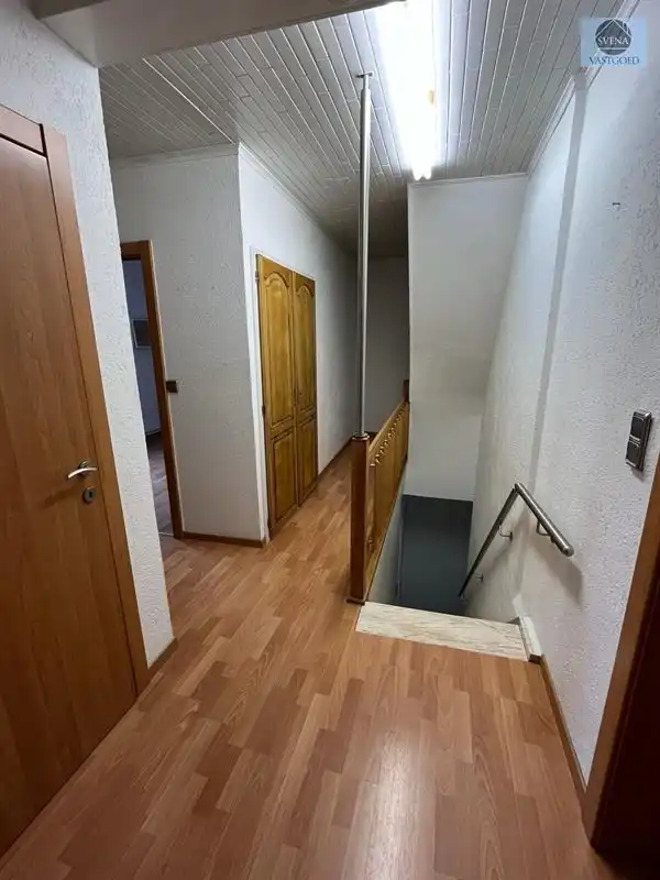 HANDELSHUIS EN APPARTEMENT MET 5 SLAAPKAMERS foto 7