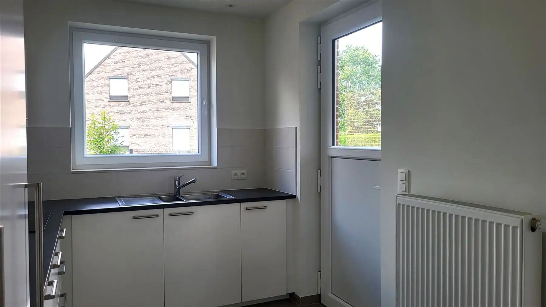 Instapklare woning met 3 slaapkamers en gezellige tuin foto 5