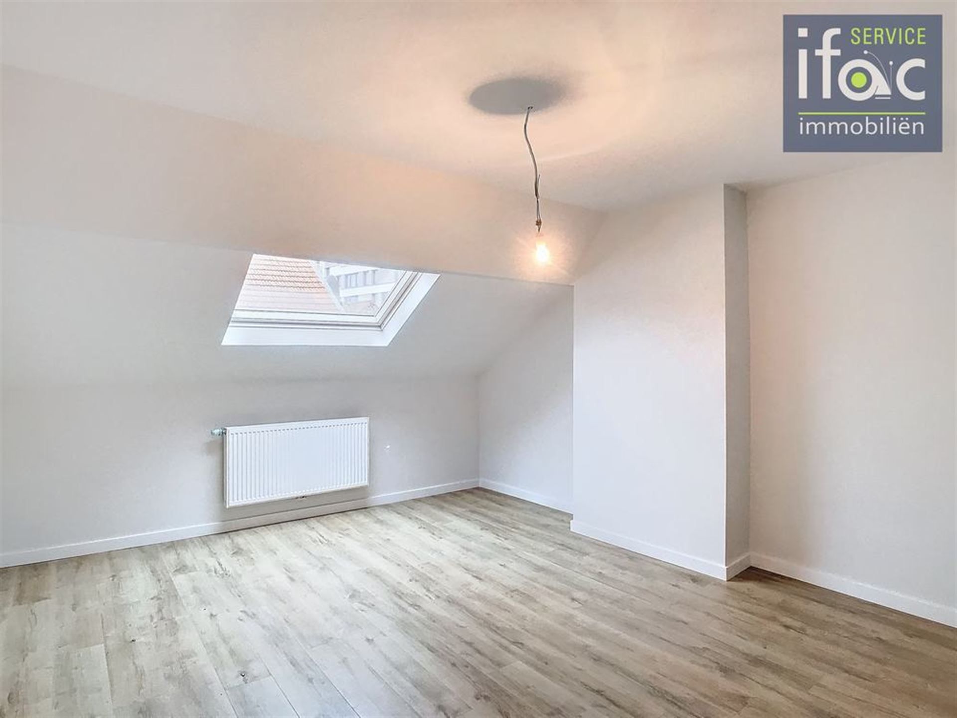 Aangename en volledig gerenoveerde duplex foto 7