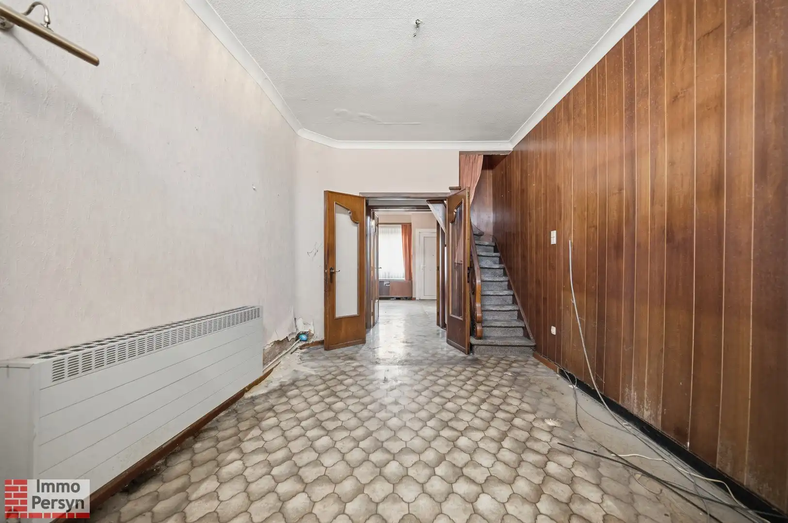 Te renoveren rijwoning met tuin in hartje Zichem foto 3
