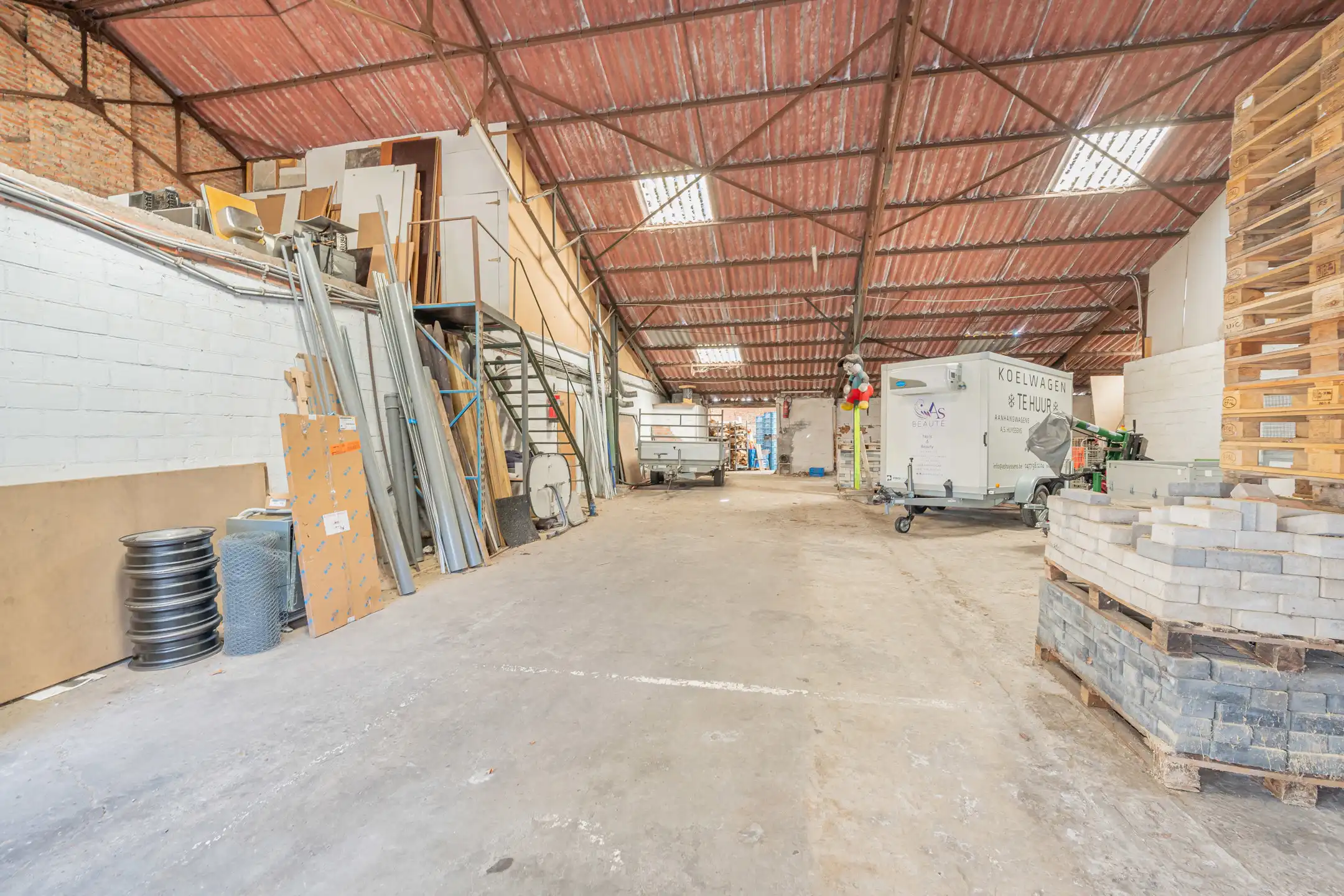 Te renoveren woning met magazijn op ruim perceel (833 m²)  foto 15